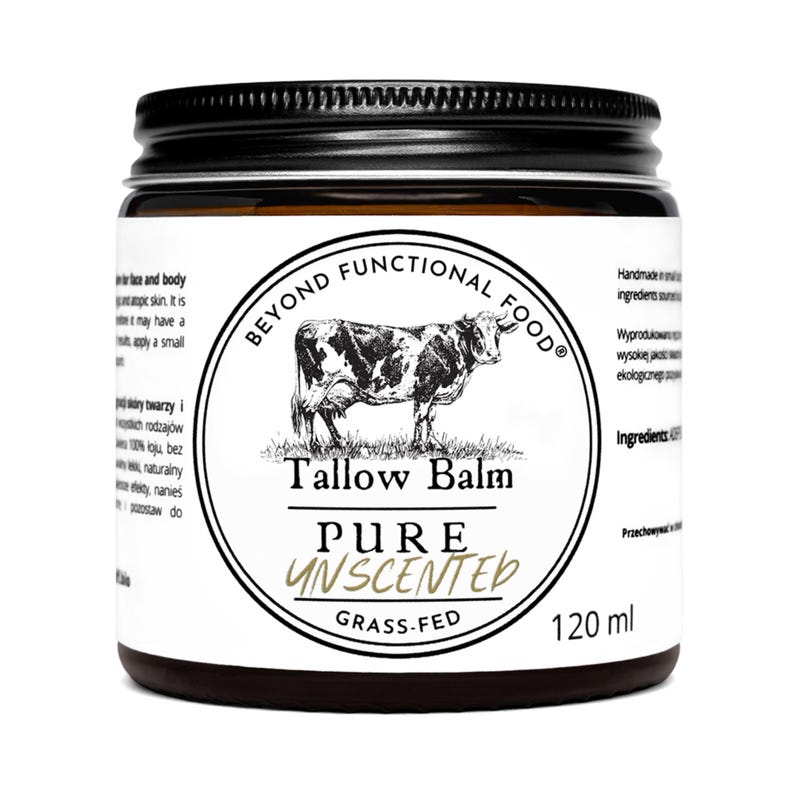 May include: A 120 ml jar of Beyond Functional Food Tallow Balm with a black screw-top lid. The white label features a black and white illustration of a cow, the text Tallow Balm, Pure Unscented, and Grass-Fed, along with additional printed text.
