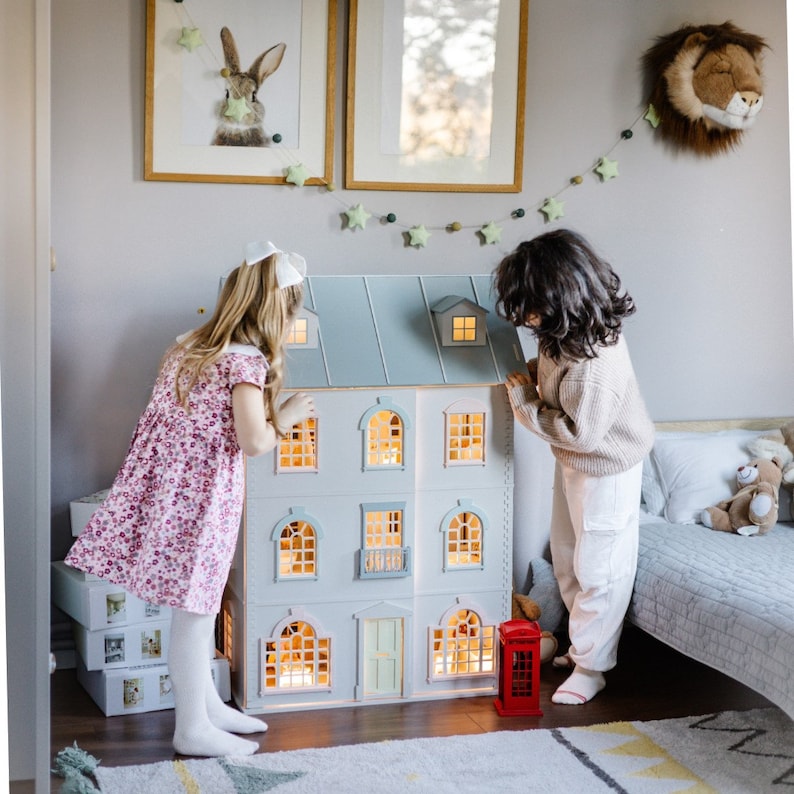 kids playing dollhouse