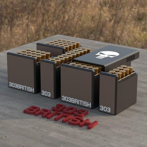 May include: A collection of .303 British ammunition boxes, each filled with brass-colored bullets. The boxes are dark brown with white text reading "303 BRITISH" and "303". One box features a white skull logo. A red 3D text of "303 BRITISH" is also present.