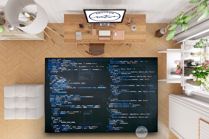 May include: A top-down view of a home office desk with a computer monitor displaying code on a dark blue background. The code is written in a light blue font and includes the words "error", "matrix", "buffer", and "data". The desk is made of wood and has a variety of items on it, including a mouse, a cup of coffee, and a plant. The desk is in front of a white wall.