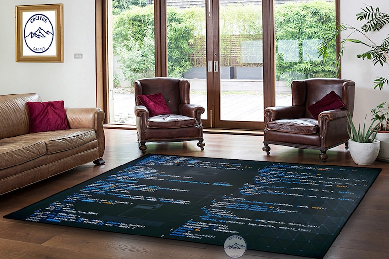 May include: A black and blue rug with code printed on it. The rug is in a living room with two brown leather armchairs and a brown leather sofa. The rug has a logo in the bottom right corner that says "Erciyes Carpet".