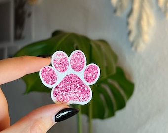 Pegatinas rosas con huellas de patas o marcas de besos