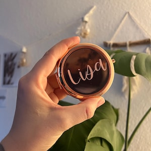 Personalized folding mirror