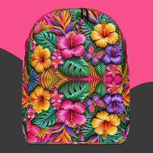 May include: A backpack featuring a vibrant tropical pattern with large pink, yellow, and purple hibiscus flowers, green monstera leaves, and orange bird of paradise blooms. Two butterflies with purple and pink wings are integrated into the floral design.