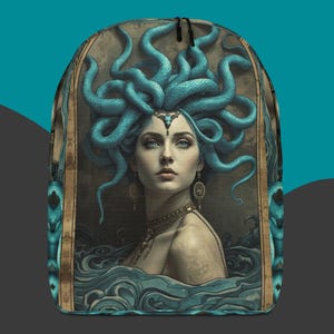 May include: Rucksack with a detailed illustration of Medusa, depicted with turquoise snakes for hair, a jeweled crown, and ornate jewellery. The artwork is set against a dark background with a teal accent.