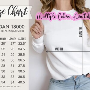 Op de afbeelding: Maattabel voor een Gildan 18000 heavy blend sweatshirt. De tabel toont de afmetingen in inches voor maten S tot en met 5XL, inclusief breedte, lengte en mouwlengte.