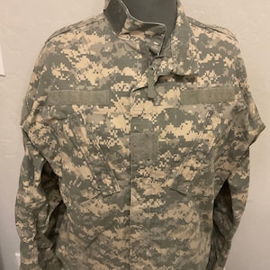 US Military Issued ACU/ABU Digital Camo Shirt Jacket.  Like new. Available in various sizes.