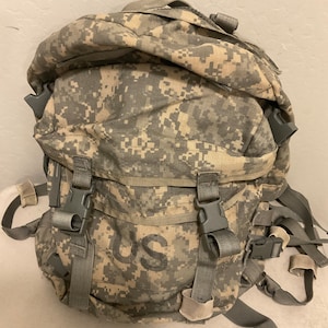 Military Issued Molle Assault Pack / Back pack .  ACU Camo Used