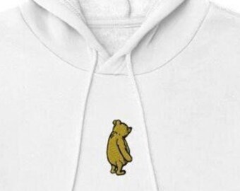 Felpa con cappuccio unisex con orsetto Pooh ricamato. Onora il classico personaggio degli anni '20 con stile. Regala pooh per le feste.