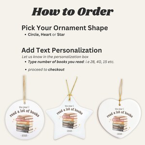 May include: White ceramic ornaments in circle, star, and heart shapes, each with a stack of books illustration and the text "read a lot of books" and "-2025-". Gold string for hanging.