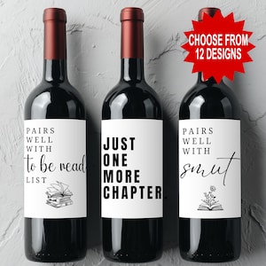 May include: Three wine bottles with white labels and dark red tops. The labels feature black text: "Pairs well with to be read list", "Just one more chapter", and "Pairs well with smut". A red starburst reads "Choose from 12 designs".