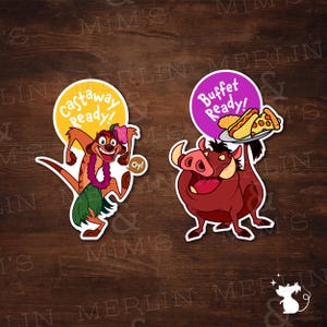 May include: Two die-cut stickers featuring cartoon characters. One is a meerkat wearing a green grass skirt, purple lei, and pink flower, with a yellow speech bubble saying Castaway Ready! and a small bubble saying Oy!. The other is a warthog holding a plate of food with a purple speech bubble saying Buffet Ready!.