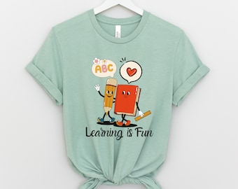 Camiseta de professor "Aprender é divertido": camiseta de volta às aulas