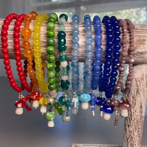 Colorful glass beads with hanging mushroom and beads