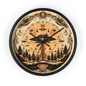 May include: A round clock with a black frame and a beige face. The clock face features a detailed illustration of a UFO hovering over a forest with a tall tower in the center. The illustration is surrounded by a circle of symbols and designs.