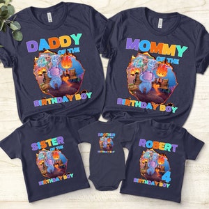 May include: Set of five navy blue t-shirts featuring a cartoon image of a blue monster with a fire monster. The shirts have the text "Daddy of the Birthday Boy", "Mommy of the Birthday Boy", "Sister of the Birthday Boy", "Brother of the Birthday Boy", and "Robert 4 Birthday Boy".