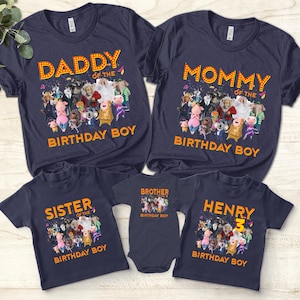 May include: Set of five navy blue t-shirts featuring the characters from the movie Sing 2. The shirts have the text "Daddy of the Birthday Boy", "Mommy of the Birthday Boy", "Sister of the Birthday Boy", "Brother of the Birthday Boy", and "Henry 3 Birthday Boy".