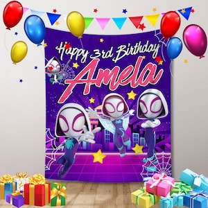 May include: A birthday banner with the text "Happy 3rd Birthday Amela" against a purple backdrop. The design includes cartoon characters, balloons, and gift boxes. The colour scheme features purple, pink, and yellow.