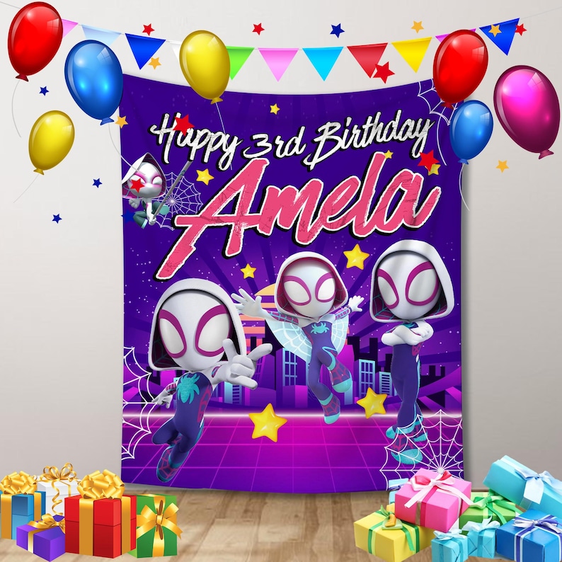 May include: A birthday banner with the text "Happy 3rd Birthday Amela" against a purple backdrop. The design includes cartoon characters, balloons, and gift boxes. The colour scheme features purple, pink, and yellow.