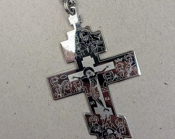Gran cruz pectoral, grabada en acero inoxidable sobre cadena, con imágenes de santos del siglo XX / Nuestra Señora de Fátima / clero / obispo