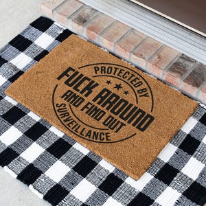 Funny Custom Door Mat: Protected by F Around and Find Out