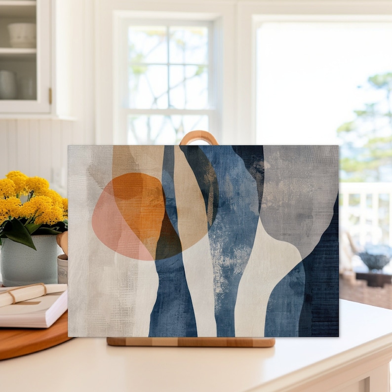 May include: Abstract art print with blue, beige, and orange shapes on a white background.