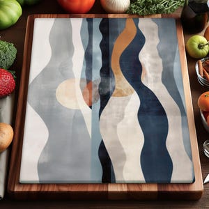 May include: A white ceramic mug with a black handle and the text "But First, Coffee" in a bold, black font. The mug is sitting on a wooden surface. The mug is approximately 4 inches tall.