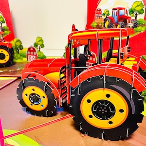 Cartão de felicitações pop-up 3D de caminhão trator agrícola vermelho - Feliz aniversário, perfeito para jovens fazendeiros ou crianças. Compre online https://origamipopcards.com/