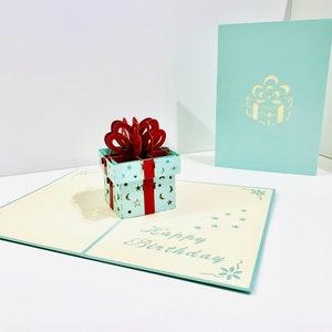 OrigamiPopCards.com - Cartão gigante turquesa para presente de aniversário 3D pop-up - Compre online www.origamipopcards.com Cartão comemorativo feito à mão