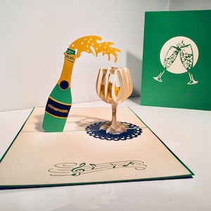 Garrafa de champanhe com vidro transparente criada por Origami Pop Cards, Sydney Austrália Cartões pop-up de papel 3D OrigamiPopCards.com feitos à mão