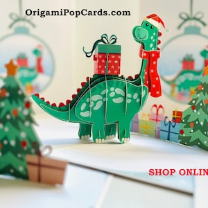 Kerstman babydinosaurus met kerstcadeaus 3D pop-up vrolijk kerstfeest wenskaart Online winkelen https://origamipopcards.com/ Thank You Love