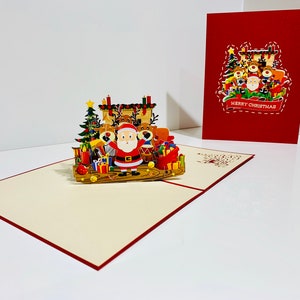 Linda festa de Natal com renas e Papai Noel ~ Cartões de felicitações pop-up 3D feitos à mão com amor Compre online https://origamipopcards.com/