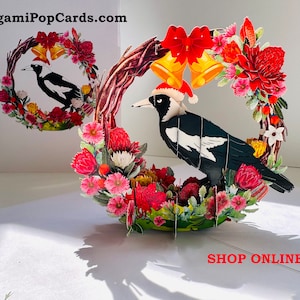 Cartão de felicitações pop-up 3D com pássaro pega australiano e guirlanda de flores nativas australianas Feliz Natal Compre online https://origamipopcards.com/Love