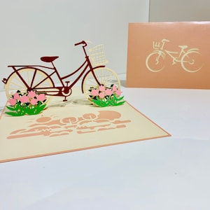 Cartão Pop-up de Bicicleta para Meninas - Criado por Origami Pop Cards - Cartões Pop-up de Papel Mágico 3D - Sydney, Austrália. OrigamiPopCards.com