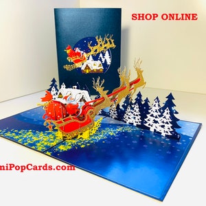 Cartão de Feliz Natal Pop-up 3D Premium com Trenó Mágico do Papai Noel e Rena Voadora, feito à mão, compre online https://origamipopcards.com/