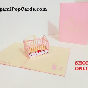 Babybedje in roze 3D-verjaardagswenskaart ~ handgemaakte origami-verjaardagsuitnodigingskaart ~ SYDNEY SHOP ONLINE https://origamipopcards.com/
