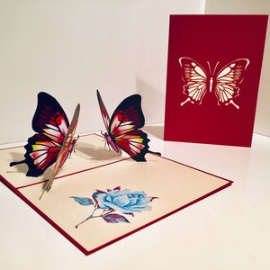 Cartão de borboletas rosa-avermelhadas - Criado por Origami Pop Cards Sydney Austrália Cartões pop-up de papel 3D - OrigamiPopCards.com Feito à mão com amor