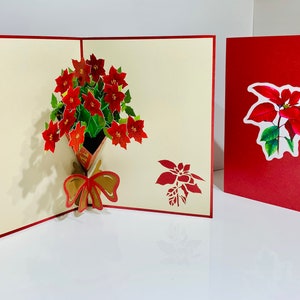 Cartão de felicitações pop-up com buquê de poinsétias floridas vermelhas ~ Criado por Origami Pop Cards com amor https://origamipopcards.com/