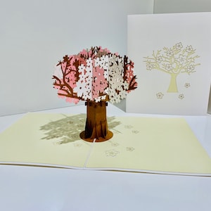 Cartão rosa e branco com flor de cerejeira Sakura - Criado por Origami Pop Cards Cartões pop-up de papel 3D - OrigamiPopCards.com Feito à mão com amor