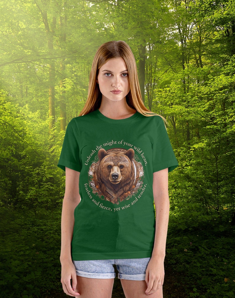 May include: Green t-shirt with a brown bear illustration and the text "Unleash the might of your wild heart, fearless and fierce, yet wise and tender."