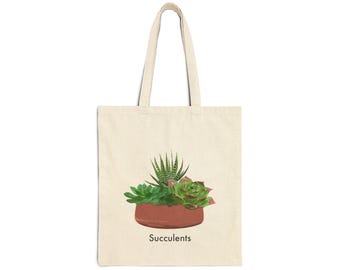 May include: A beige tote bag with a brown pot of succulents. The text "Succulents" is printed on the bag.