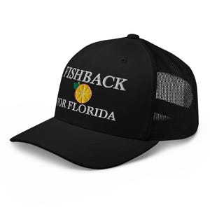 May include: Black trucker hat with the text "FISHBACK FOR FLORIDA" embroidered in white. The design includes a yellow and orange citrus fruit with a green leaf. The hat has a mesh back.