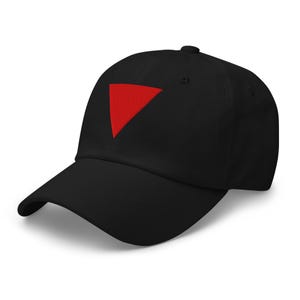 May include: Black baseball cap featuring a red triangle emblem. The cap has a curved peak and an adjustable strap. This hat is a versatile accessory suitable for various casual occasions.