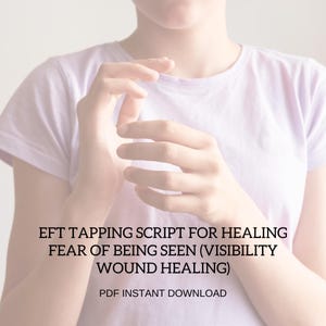 May include: A person wearing a light purple t-shirt with hands in front. Text on the image reads: EFT TAPPING SCRIPT FOR HEALING FEAR OF BEING SEEN (VISIBILITY WOUND HEALING) PDF INSTANT DOWNLOAD.