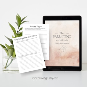 May include: A digital parenting workbook displayed on a tablet, with two worksheets and a glass vase with green leaves. The tablet screen shows the title "the PARENTING workbook" and the text "A guided journal for parents."