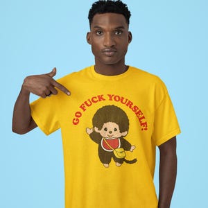 Camiseta unisex Monchhichi, camiseta gráfica vintage, camiseta retro de humor negro, camiseta divertida Monchhichi, camiseta unisex de algodón grueso