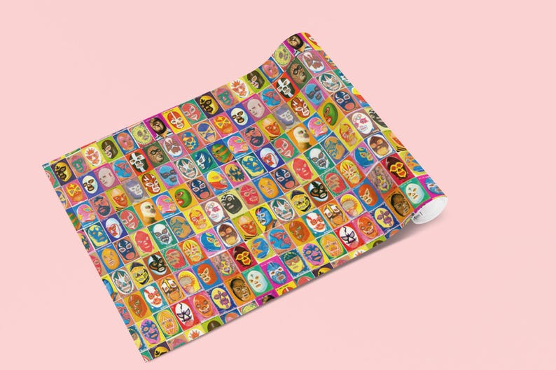 May include: A colorful wrapping paper featuring a repeating pattern of luchador masks in various colors and designs.