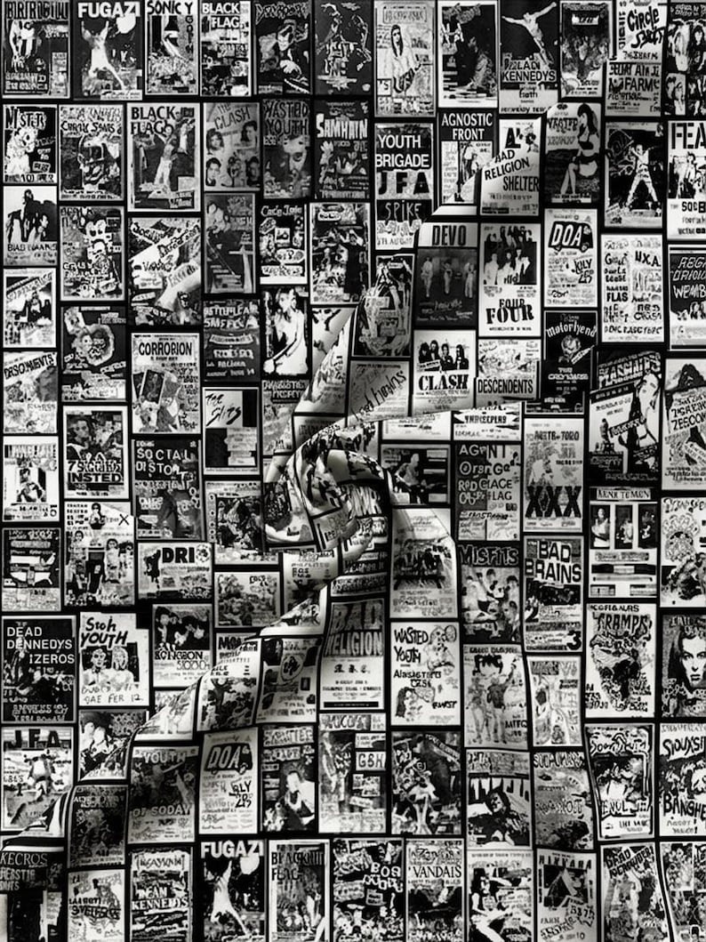 A bolt of black-and-white fabric patterned with a collage of punk rock flyers and band posters is draped with soft folds.