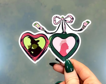 Pegatina de medallón de corazón rosa y verde, calcomanía de bruja buena y bruja oscura, vinilo de fantasía de mejor amiga, regalo mágico inspirado en música para diarios.