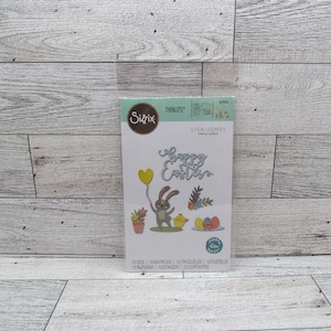 May include: A set of three ceramic mugs with a speckled, matte finish in cream, light brown, and dark brown. Each mug has a simple, minimalist design and a rounded handle.